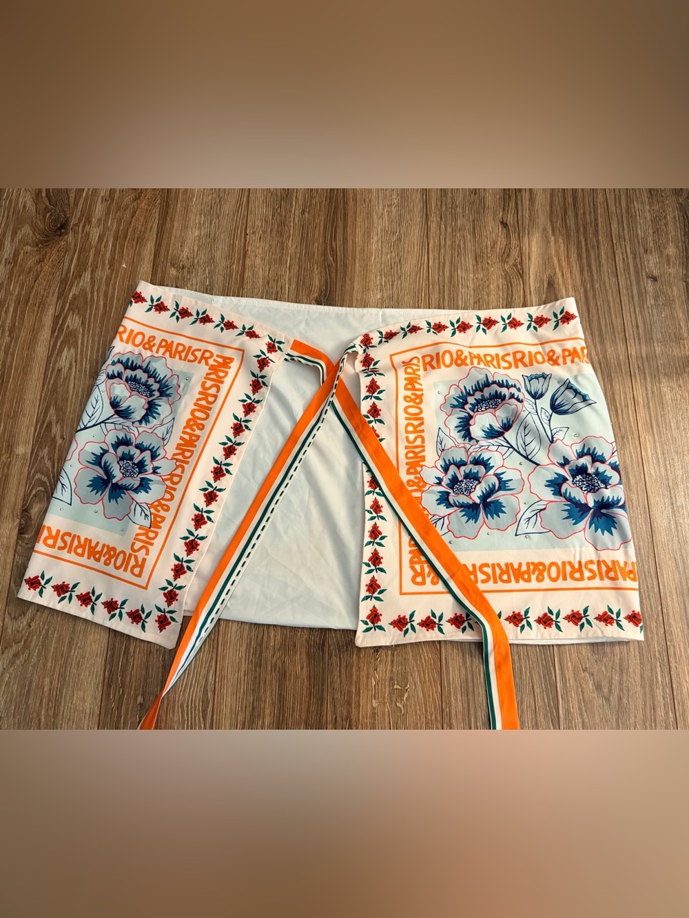 Floral Mini Wrap Skirt with Blue Blooms and Orange Trim ..It’s Giving Farm Rio